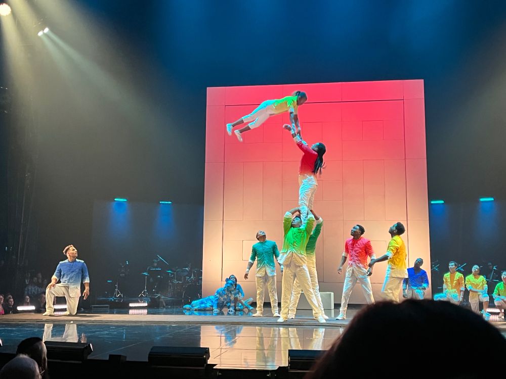 People, standing on the shoulders of other people, JUGGLE other people and throw them in the air!