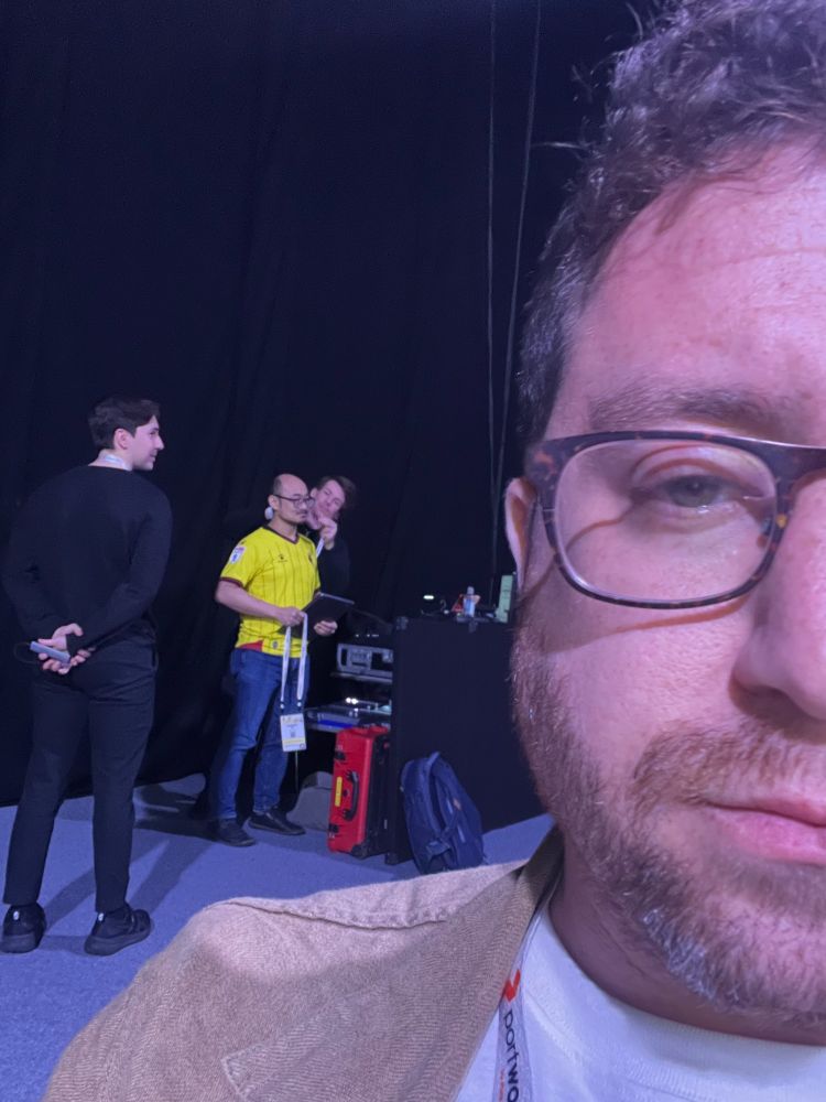 photo of Hanson Ho being mic'ed over my shoulder
