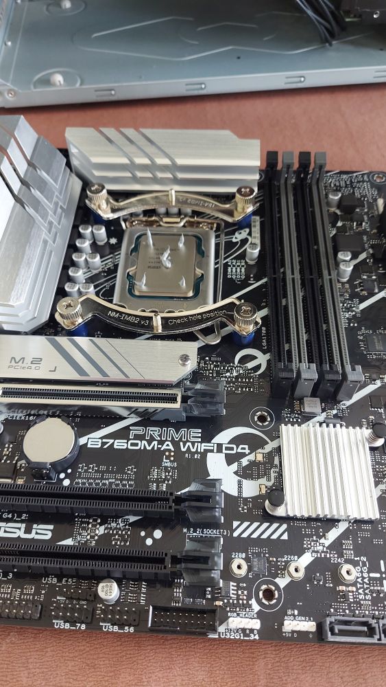 Thermal paste haphazardly added to a cpu in the classic 5 dot pattern