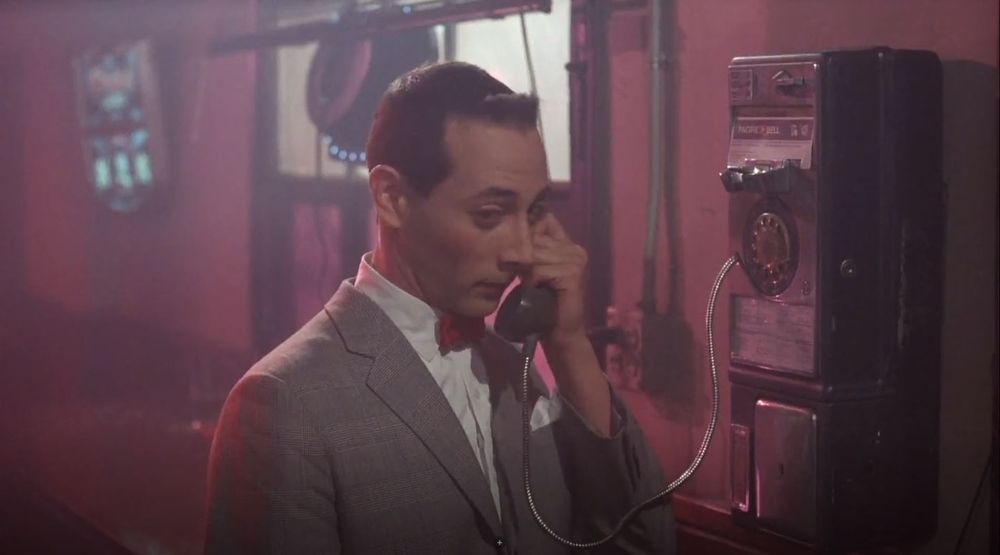 Pee Wee Herman trying to use a payphone while a bunch of bikers get rowdy in the bar. A negative consequence follows! 
