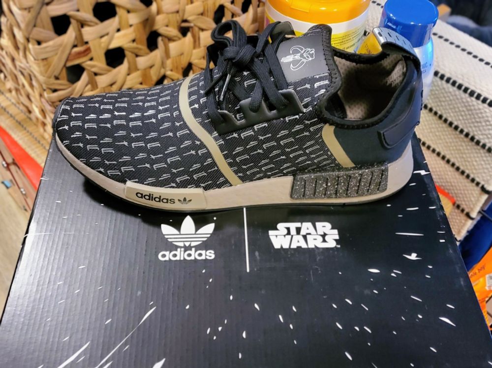 Black and grey Star Wars Adidas The Mandalorian running shoe.