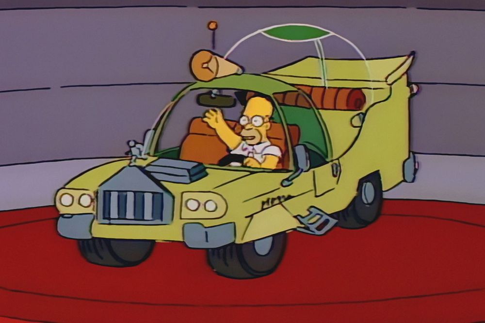 Homer Simpson in his self designed car.