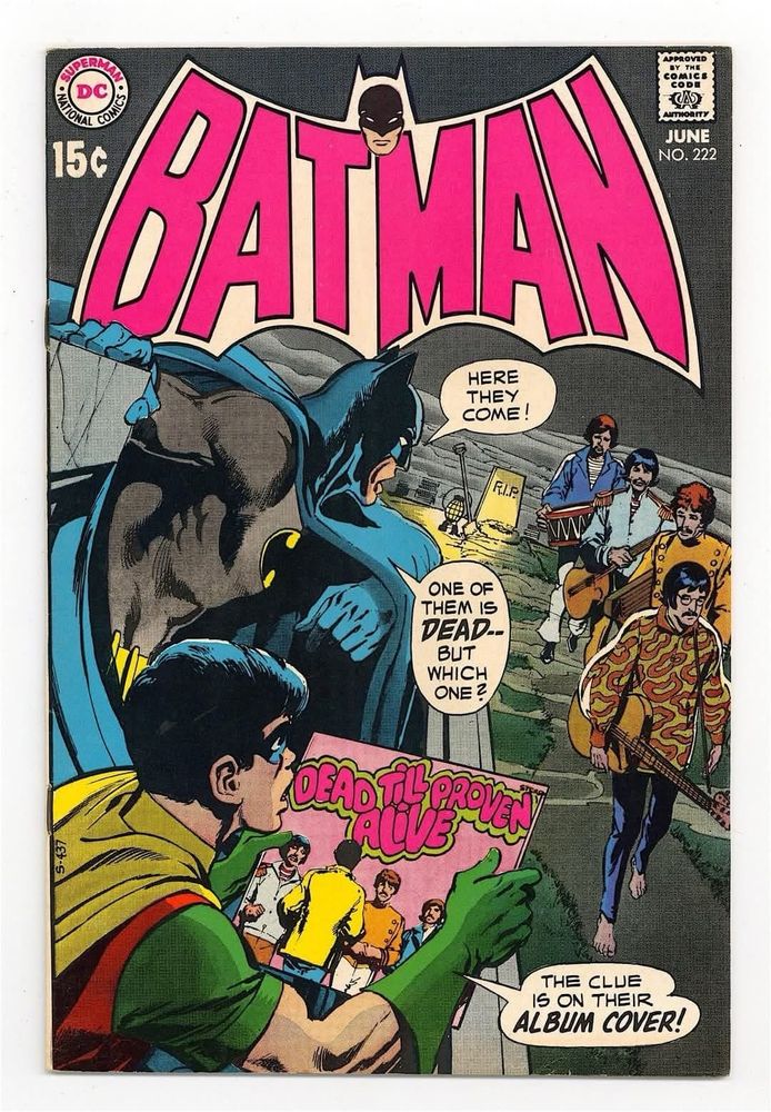 Cover of Batman comic book where Batman and Robin, who is holding an album titled “Dead Till Proven Alive,” watch four very Beatle-esque men walk by. Batman says, “Here they come! One of them is dead…but which one?” Robin says, “The clue is on their album cover!”