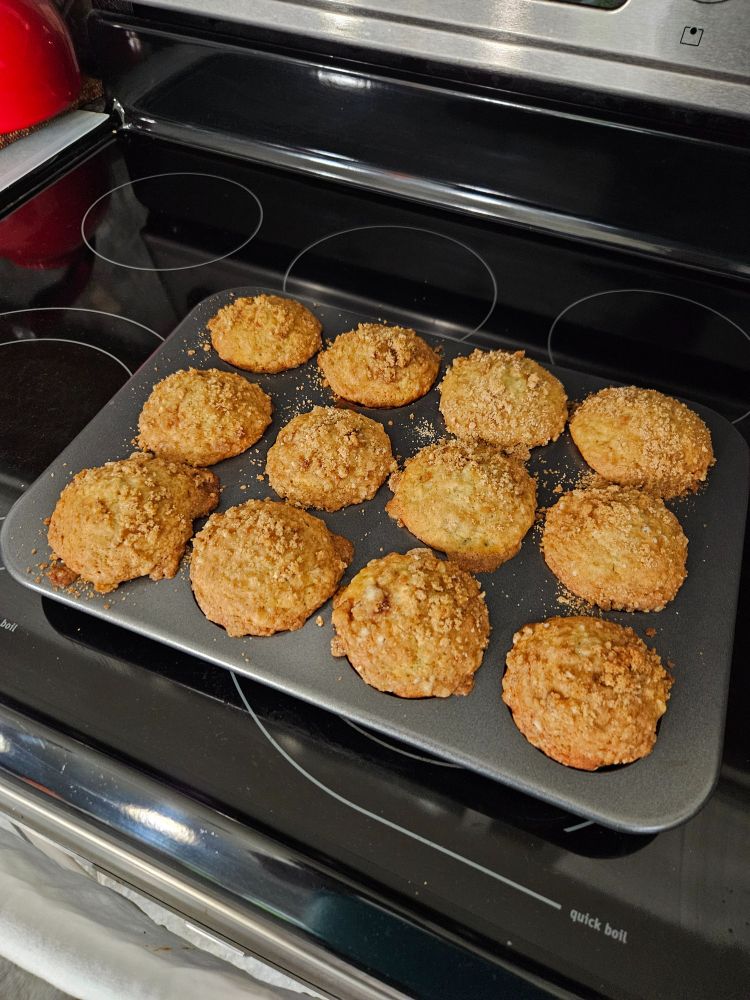 One dozen banana crumbs muffins, fresh out of the oven