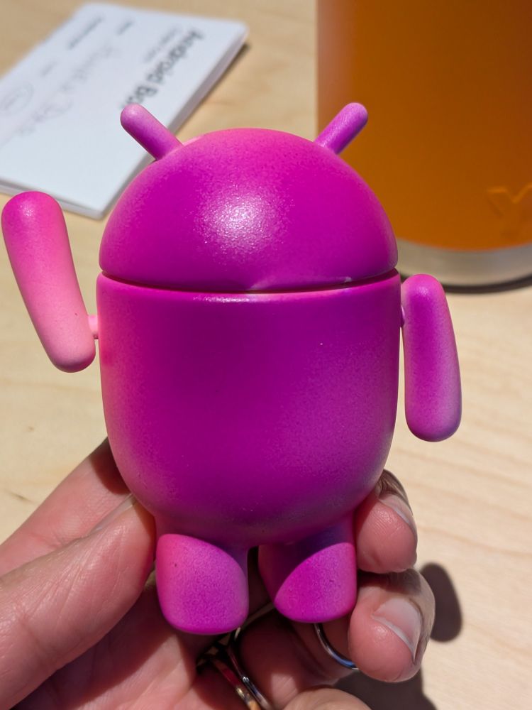 The back of the bot showing a purple/pink gradient from top to bottom.