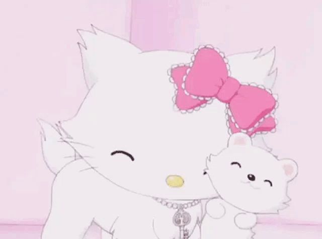 a white hello kitty with a pink bow on her head is holding a white kitten .