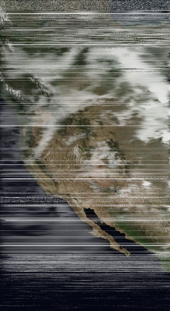 A satellite image of the western half of North America.