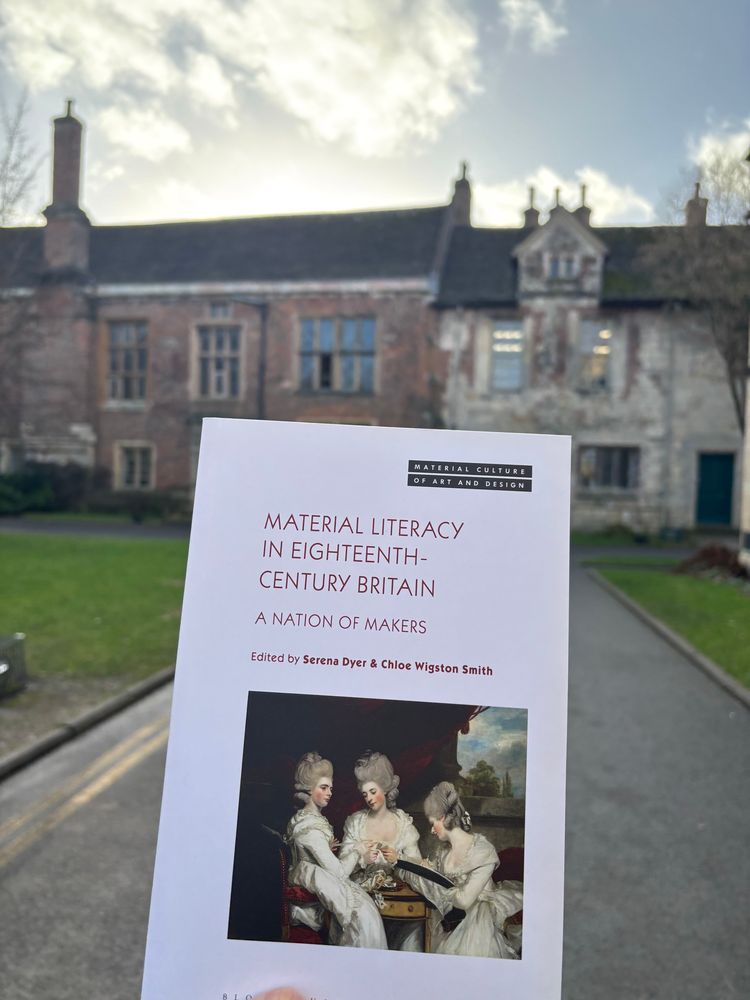 The book Material Literacy in 18th Century Britain, posed before the King’s Manor building in York.
