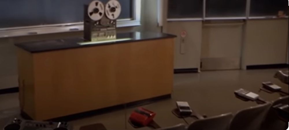 Screenshot from Real Genius, showing tape recorders recording tape-recorder.