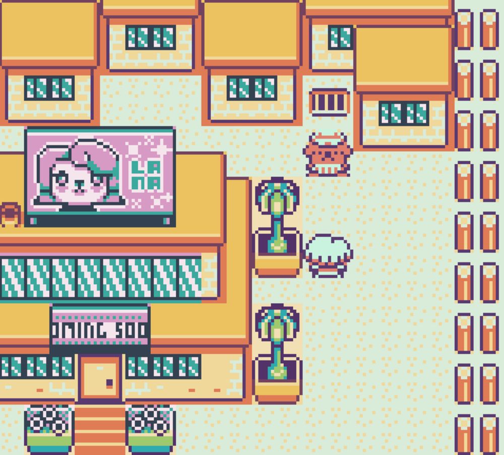 Captura de tela do jogo 8-bit em pixel art "Toni Island Adventure" mostrando Toni, um cachorro laranja marinheiro, em meio a uma cidade de frente a Lana, uma cachorrinha branca. À esquerda está um cinema com um outdoor com a imagem de Lana e seu nome escrito ao lado, abaixo dele, uma outra placa onde lê-se "COMING SOON".