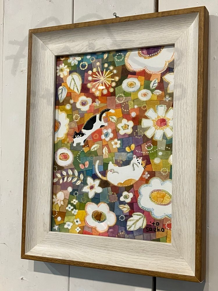 「春色の中で咲く花とネコたち」