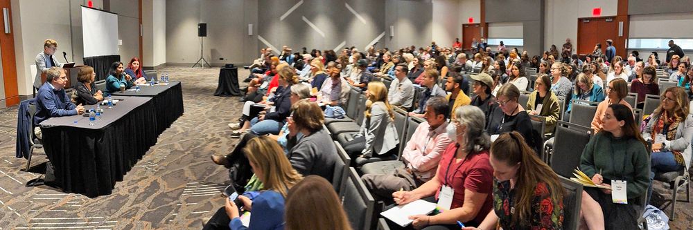 Panoramic photo of the packed conference room attending the 2024 Pitch Slam during Science Writers 2024 in Raleigh.