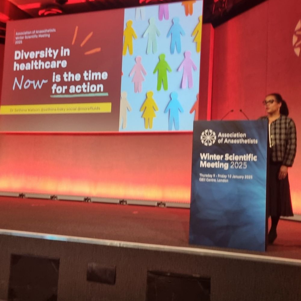 Dr Watson in front of her title slide, "Diveristy in healthcare, now is the time for action".