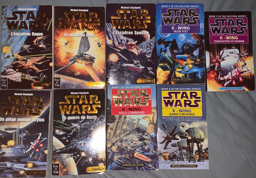 All 9 X-Wing novels by Michael Stackpole and Aaron Allston. First five novels are French editions from the late 90s while the other are all British English language editions