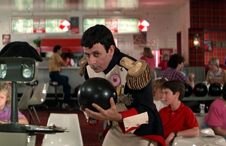 a still image of napoleon bowling from the movie "bill and ted's excellent adventure". that's what everyone is saying, at least. i'm not too sure it's not the new 2023 ridley scott napoleon.