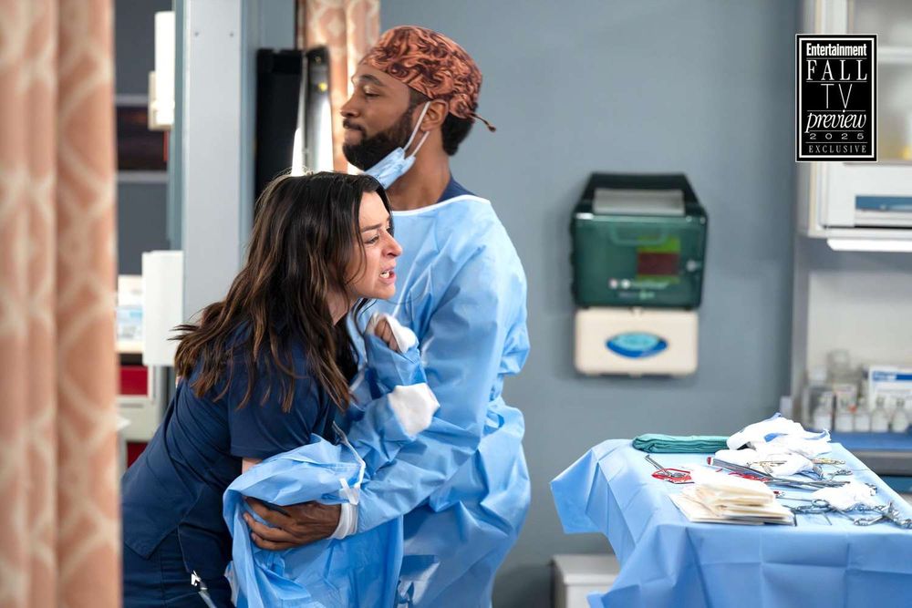 A man in surgical gear holding back a woman in scrubs in an hospital room