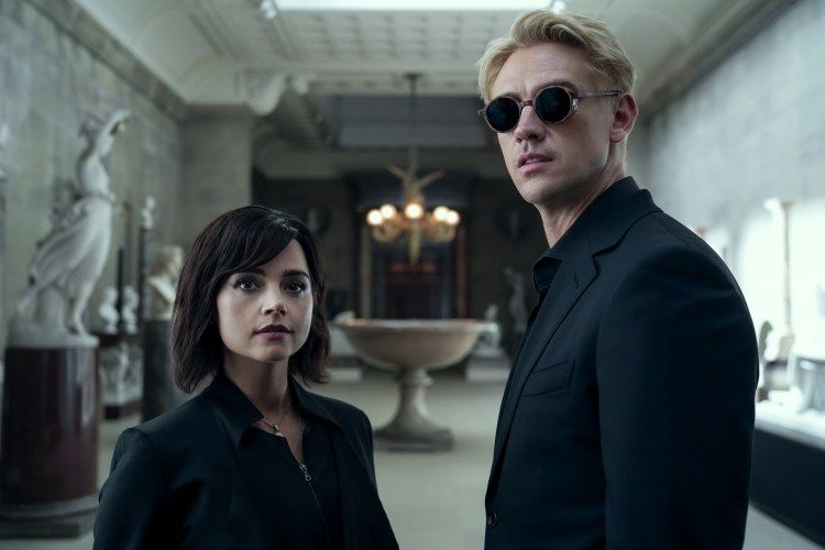 A man and a woman wearing all black