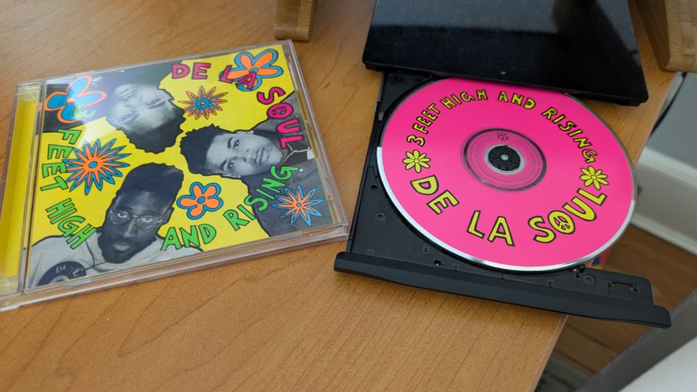 De La Soul's "3 Feet High and Rising" album cover and disc