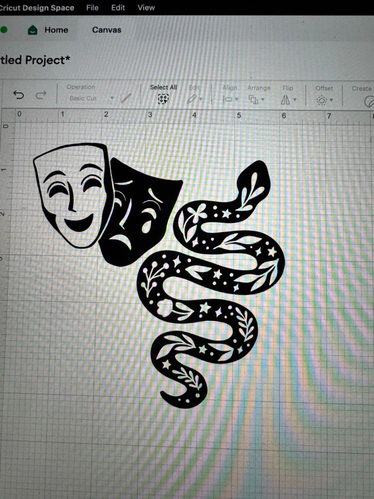 drama masks and snake