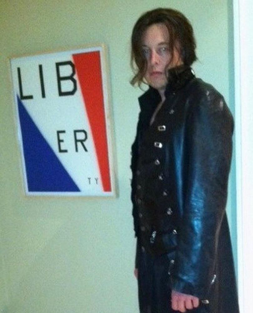 Elon Musk in his dopey Les Mis cosplay