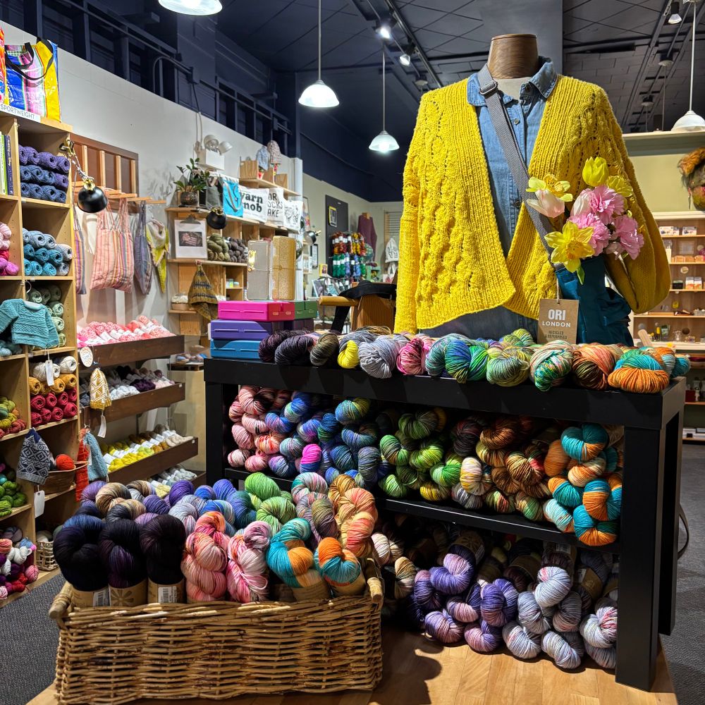 Shows the entire Sister Ananse Black History collection of yarn on display in our store 