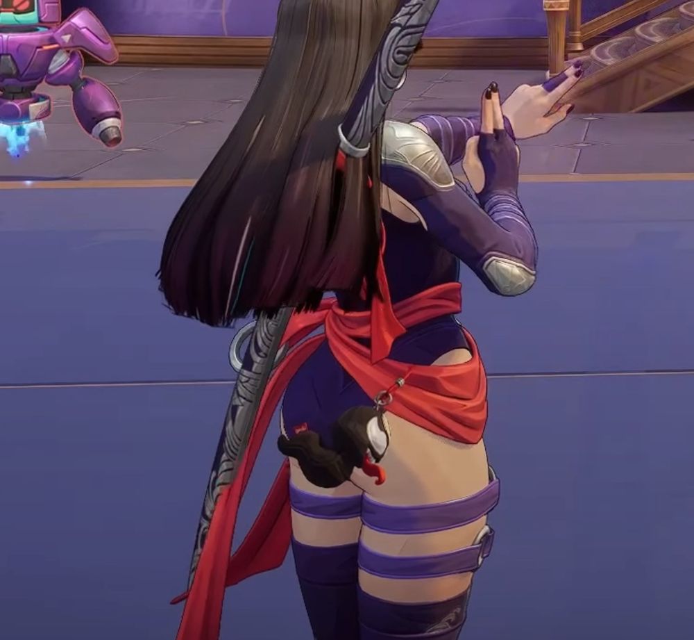 A close-up of Psylocke from Marvel Rivals with a Venom accessory attached to her sash and dangling over her butt.