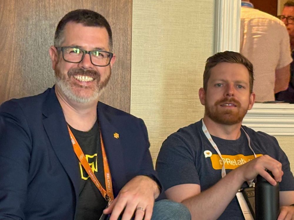 Relativity team members smiling during the ILTACON Kick-Off