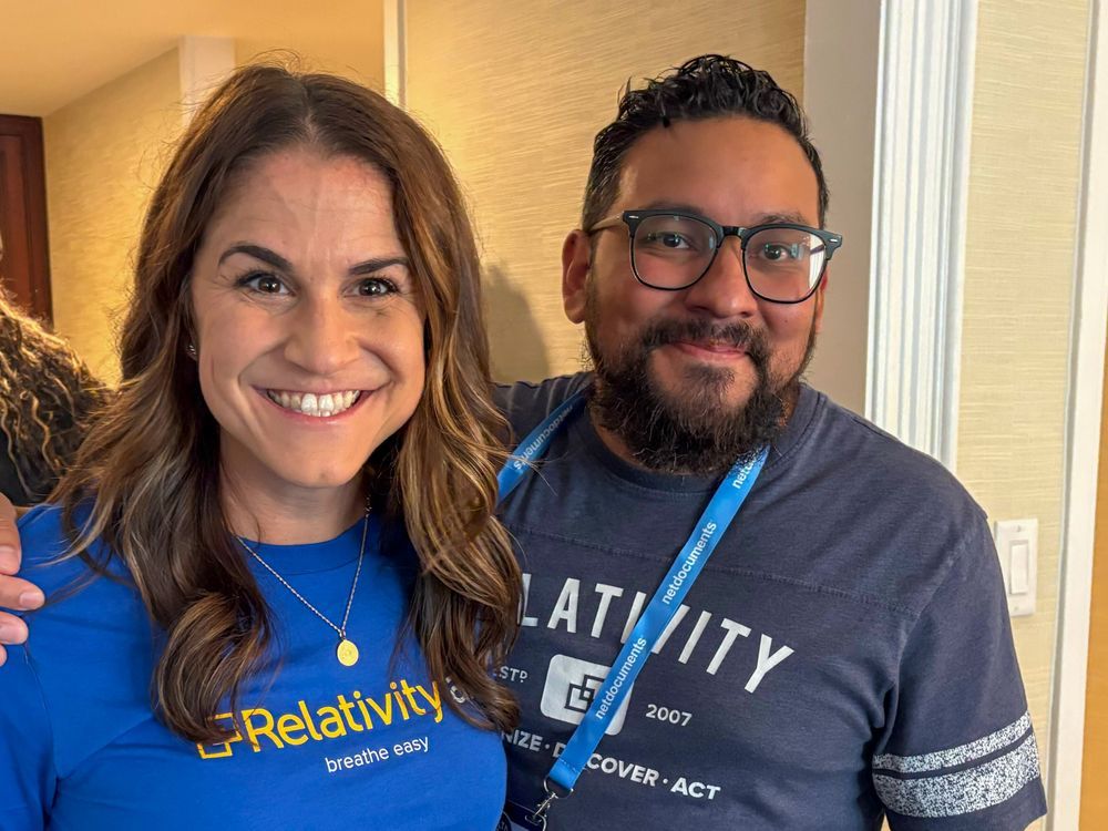 Relativity team members smiling during the ILTACON Kick-Off