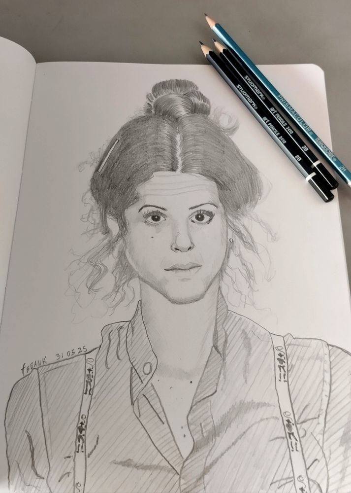 A pencil sketch of Gilda Radner