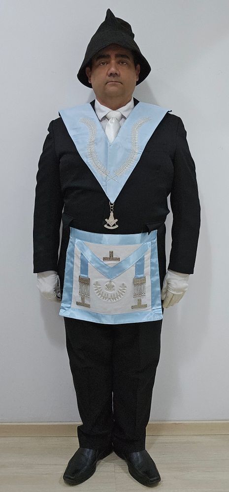 Past Master of Adonhiramite Rite wearing a past master apron, collar with jewel, white gloves, white neck tie and bucket-like felt hat, all white details in sky blue #adonhiramite #adonhiramita
