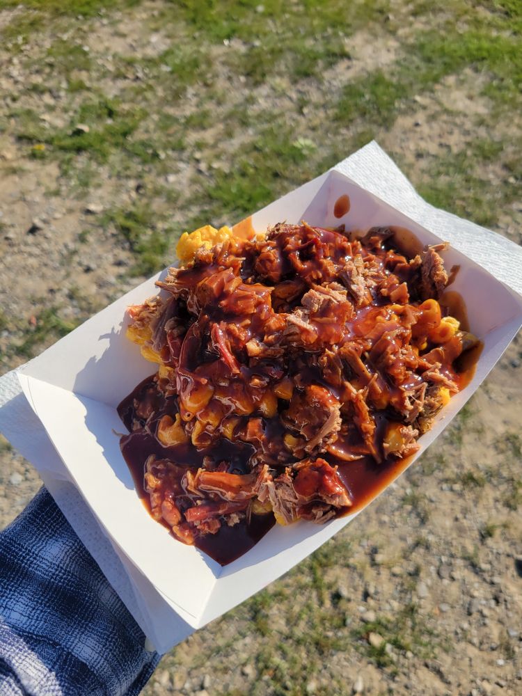 The "Lone Star Stack", a platter of brisket, mac and cheese, bbq sauce and cornbread