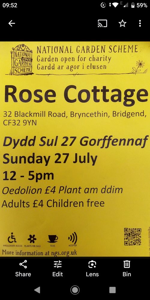 Yellow poster with back text with details of opening garden. 
