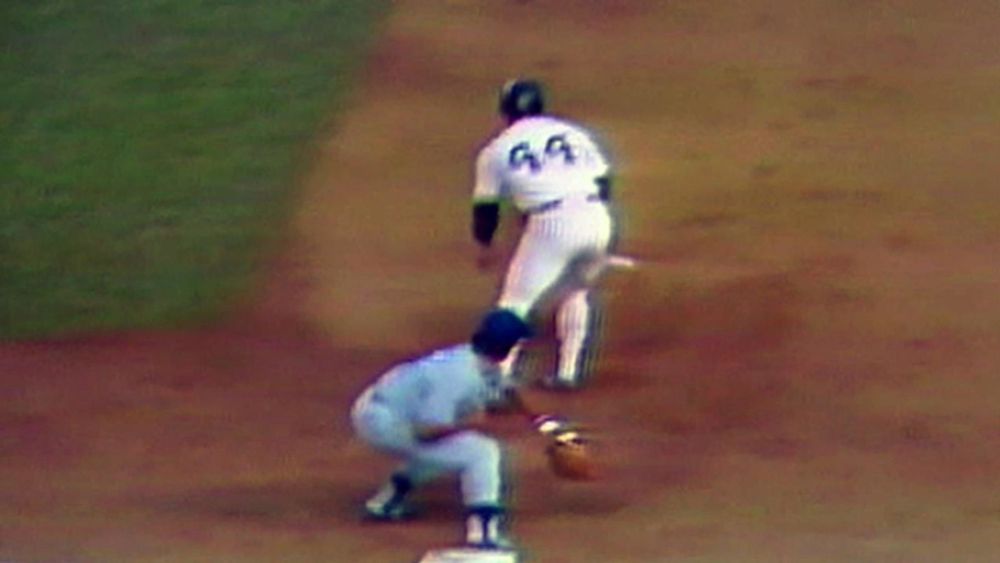Screenshot of Reggie Jackson taking a throw off his hip to prevent a crucial double play in the 1978 World Series. 