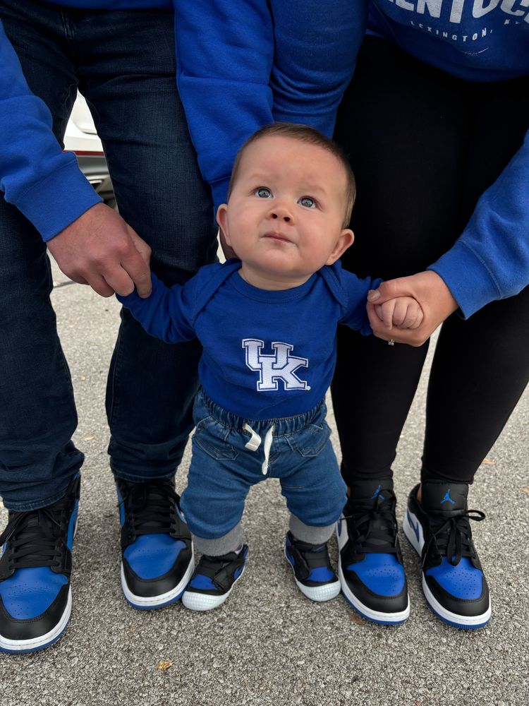 Mom, dad, and Martin in matching shoes 