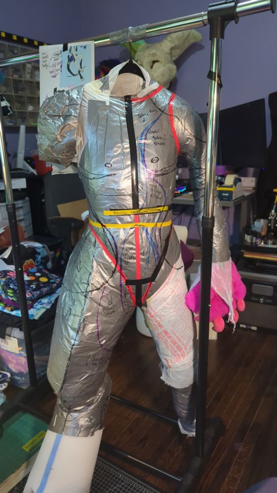 Pattern marked flushed out duct tape dummy for a fursuit 