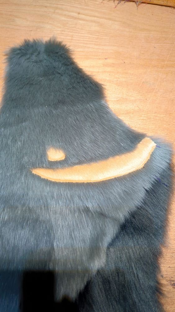 Minky applique tip surgery scar and nipple shown on silver grey short pile fur.
This will be on the chest of the body 