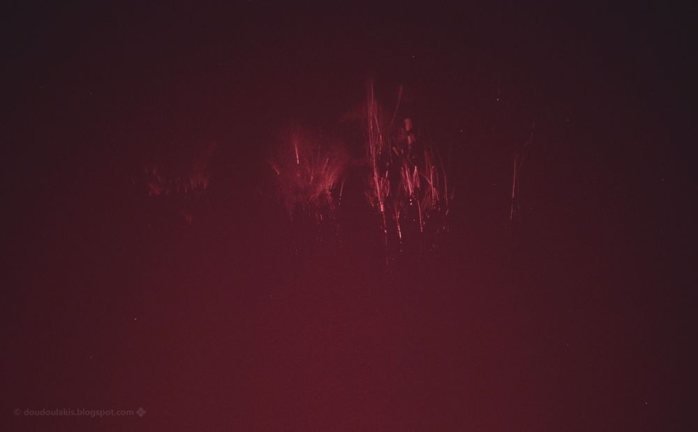 Red sprites over severe thunderstorms at NW Greece, as seen from Athens. Red filter used in order to cut light pollution below 630 nm, that's why the photo appears a bit more reddish than normal.