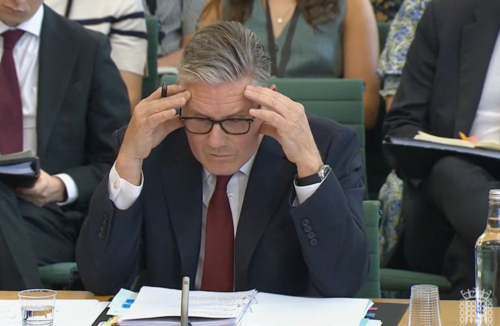 PM with his head in his hands