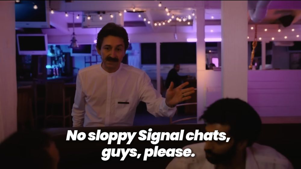 The waiter from the “Baby Cries” sketch from I Think You Should Leave.

He’s imploring the Dangerous Nights Crew:
“No sloppy Signal chats, guys, please.”