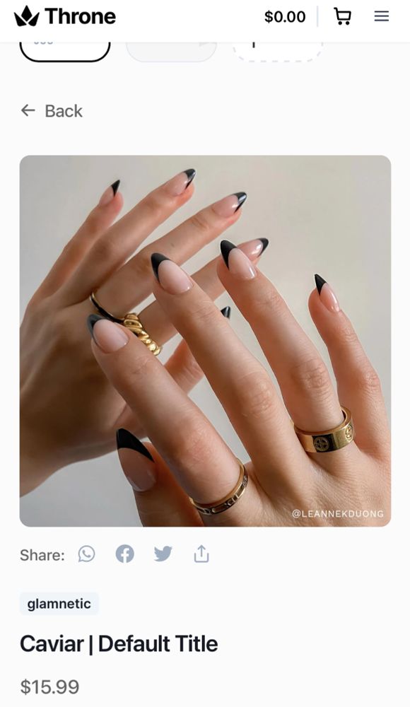 Screenshot of a set of nails called Caviar is a black French tip nails 
