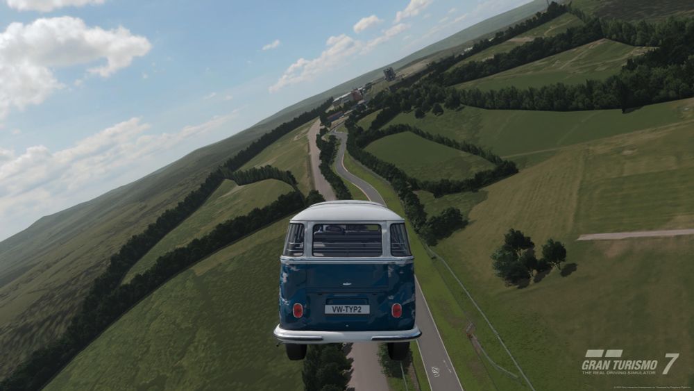 A Volkswagen van launched into the air above the Nurburgring. More out of bounds views