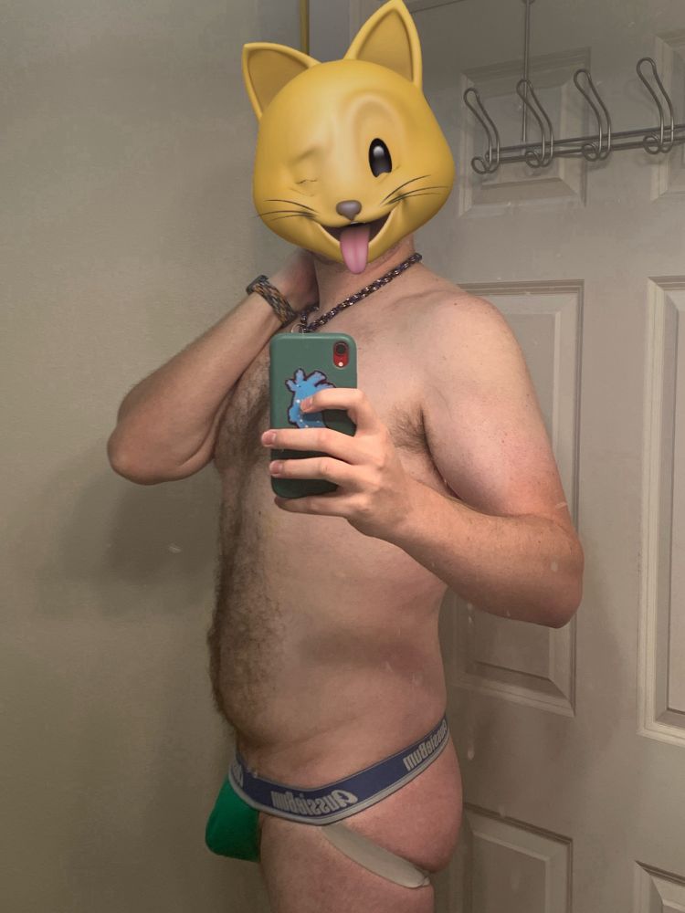 Me in a jock showing off my belly