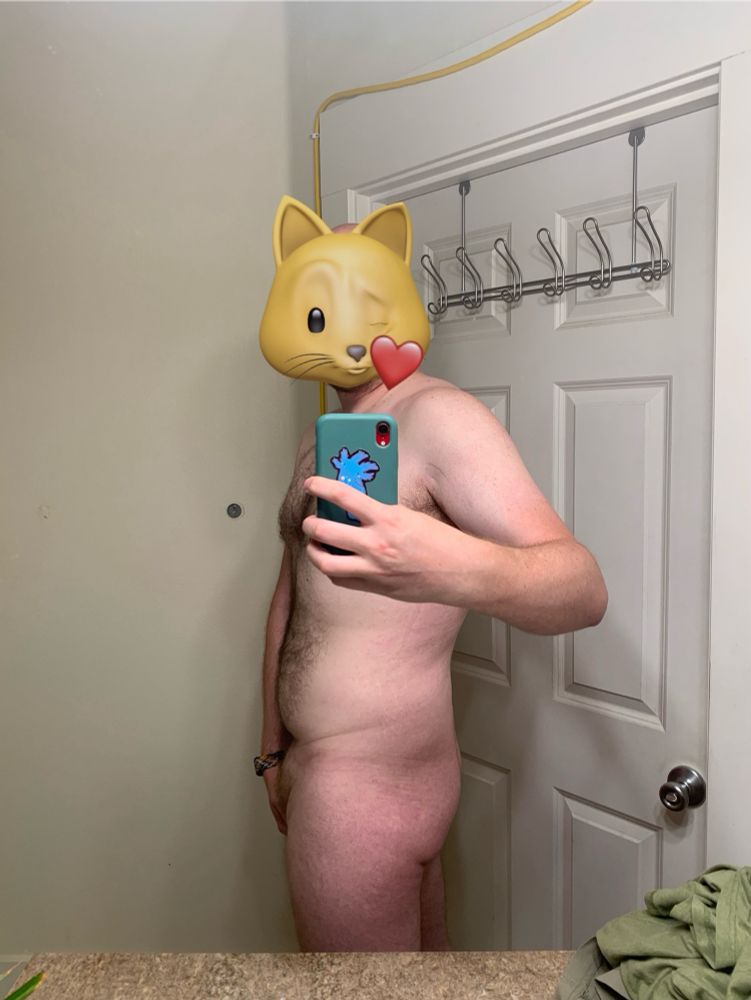Naked infront of mirror showing weight loss progress