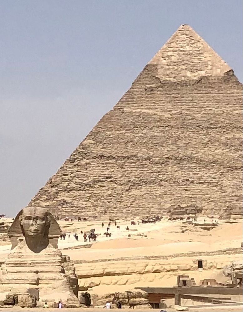Pyramid with sphinx in foreground 