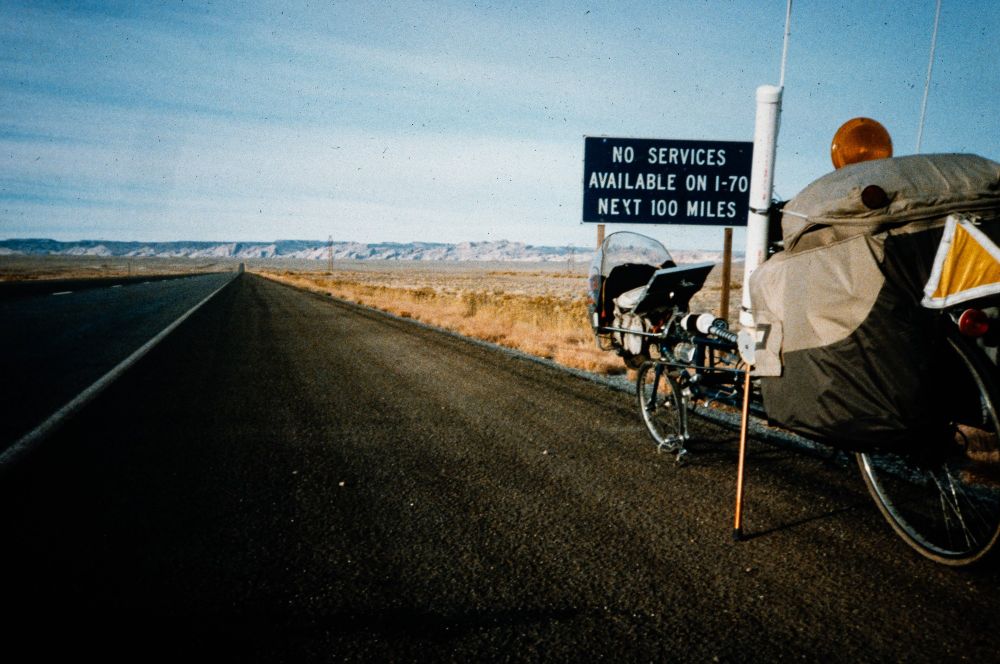 The beginning of a long day pedaling across Utah in 1984, 100 mi between services. Flying down the pass in the darkness, the wind chill was minus 18.