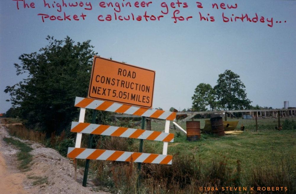 Sign in texas, 1984, road construction next 5.051 mi.