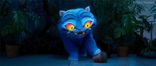 Adorable rotund blue tiger with massive flaming eyes tries repeatedly & unsuccessfully to set up a potted plant it has just knocked over
