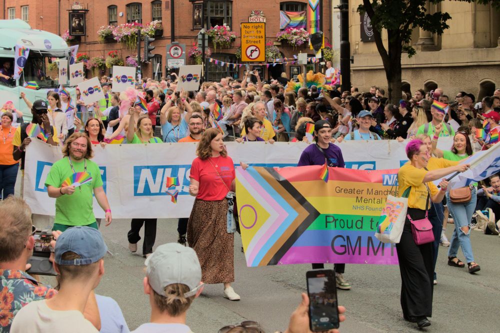 About a dozen or so people are marching for the NHS Greater Manchester Mental Health Service. Based on the duration of their ADHD assessment waiting list, I assume this is their entire workforce.