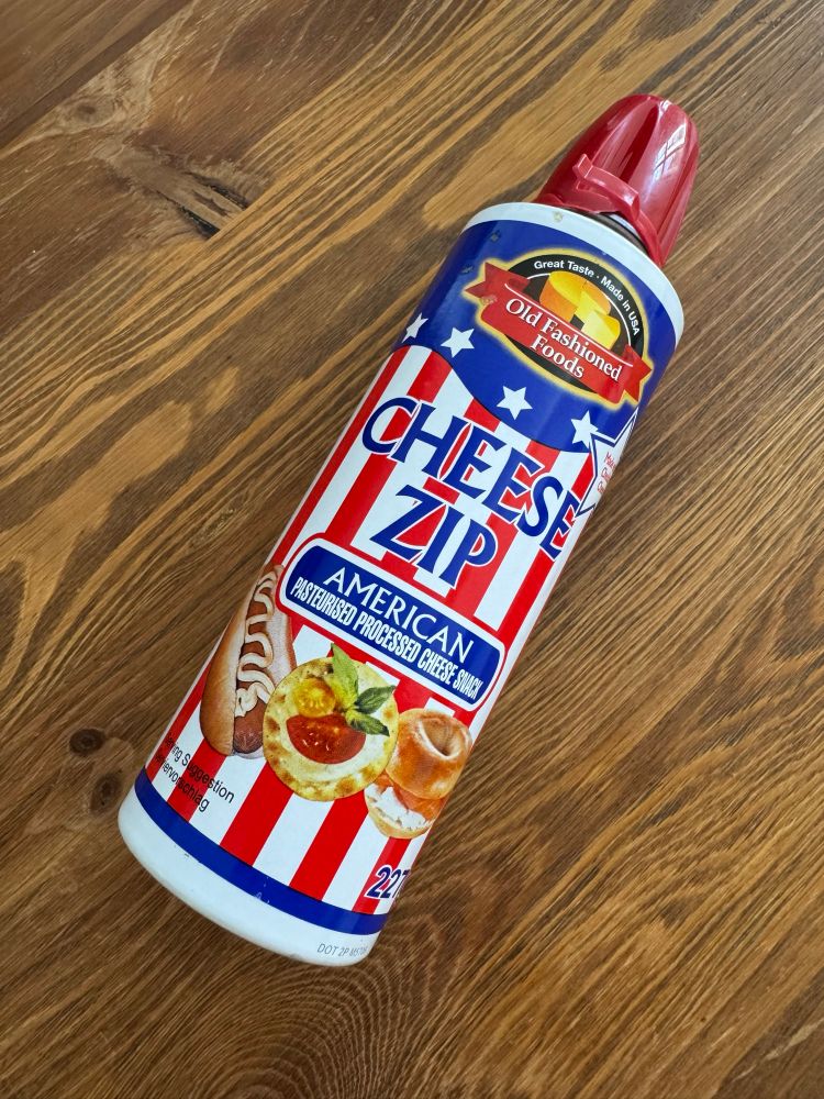 A can of CHEESE ZIP that was apparently made in the US and imported into Germany.
