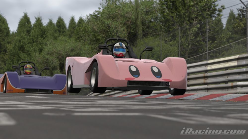 screenshot of Spec Ford in iRacing with Kirby livery taking the jump on the Nordschleife